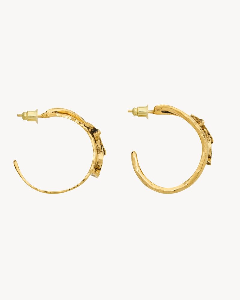 large CASSANDRE earrings in metal