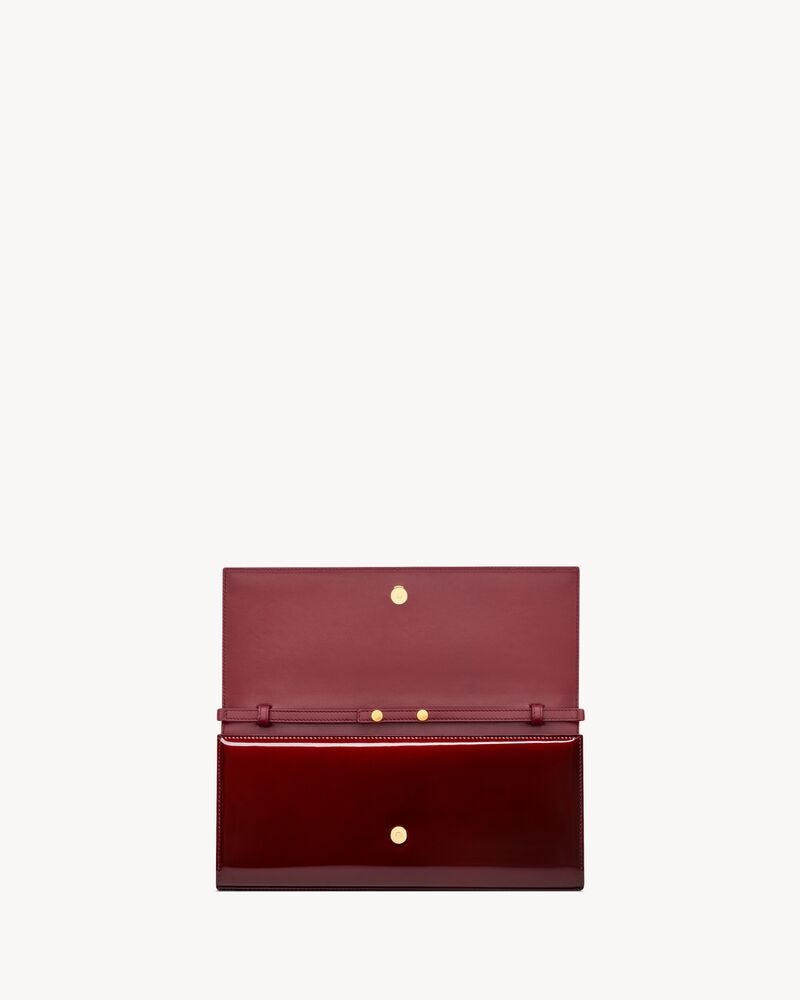 KATE clutch in patent leather